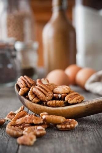 Shelled Pecans on a Rustic Farmhouse Table Journal