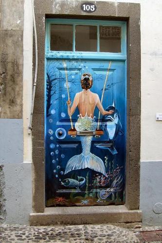 An Enchanting Mermaid on a Swing Painted Door in Madeira Portugal Journal