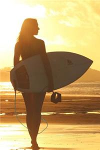 Surfer Girl with Her Surfboard on the Beach at Sunset Journal